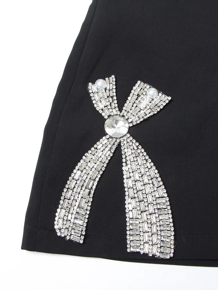 Black Pearl And Rhinestone Studded Bow Slit Mini Skirt